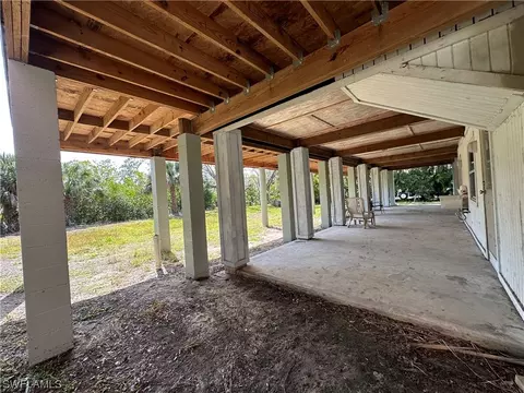 Exterior - 20708 Charing Cross Cir, Estero, FL 33928 photo 2 of 13