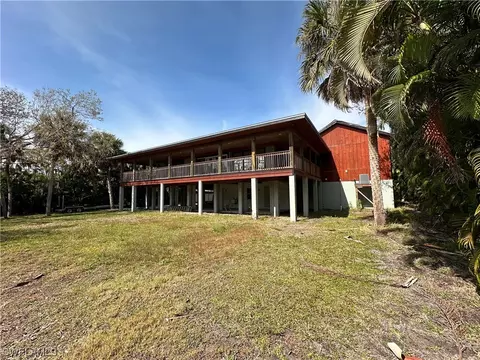 Exterior - 20708 Charing Cross Cir, Estero, FL 33928 photo 8 of 13