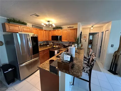 Kitchen - 20800 Pine Tree Ln, Estero, FL 33928 photo 5 of 7