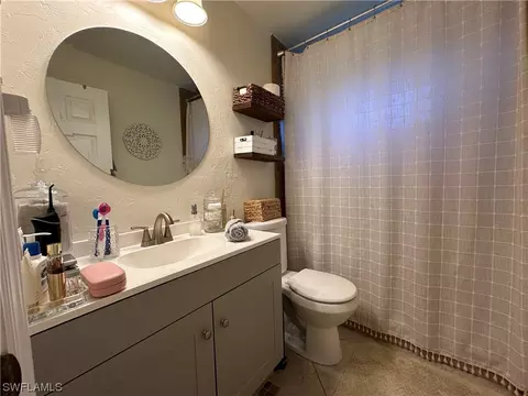 Bath - 20800 Pine Tree Ln, Estero, FL 33928 photo 1 of 2