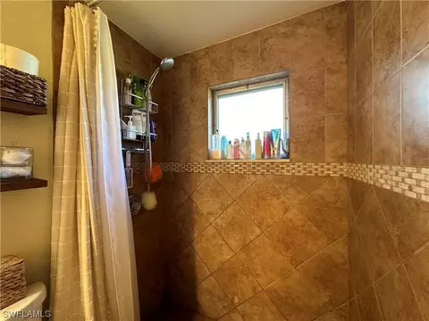 Bath - 20800 Pine Tree Ln, Estero, FL 33928 photo 2 of 2