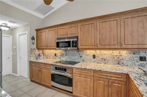 Kitchen - 1983 E Crown Pointe Blvd, Naples, FL 34112 photo 3 of 4
