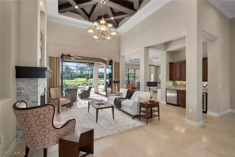 Living - 7779 Classics Dr, Naples, FL 34113 photo 3 of 10