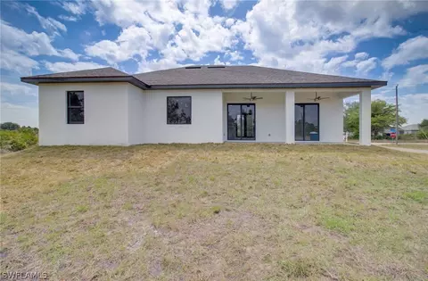 Exterior - 3218 28th St SW, Lehigh Acres, FL 33976 photo 5 of 8