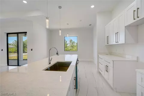Kitchen - 3218 28th St SW, Lehigh Acres, FL 33976 photo 5 of 5