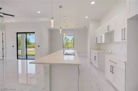Kitchen - 3218 28th St SW, Lehigh Acres, FL 33976 photo 2 of 5