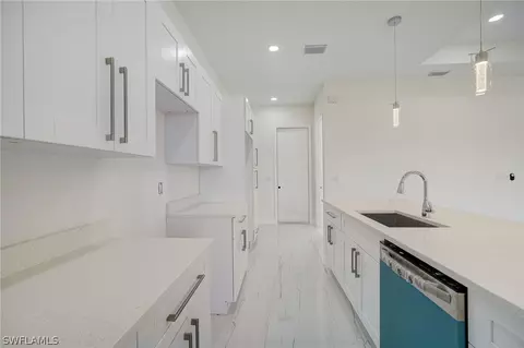 Kitchen - 3218 28th St SW, Lehigh Acres, FL 33976 photo 4 of 5