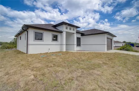 Exterior - 3218 28th St SW, Lehigh Acres, FL 33976 photo 2 of 8