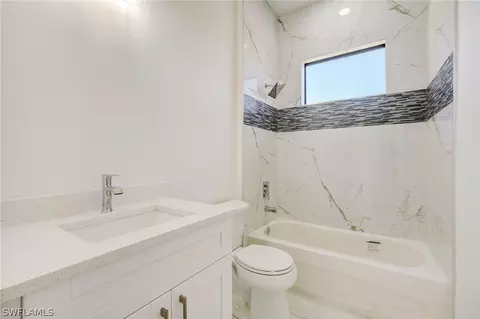Bath - 3218 28th St SW, Lehigh Acres, FL 33976 photo 2 of 3