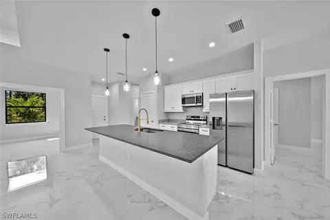 Kitchen - 3912 68th Ave NE, Naples, FL 34120 photo 5 of 7