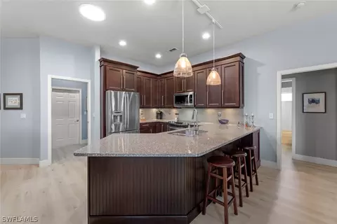 Kitchen - 11418 Stratham Loop, Estero, FL 33928 photo 4 of 5