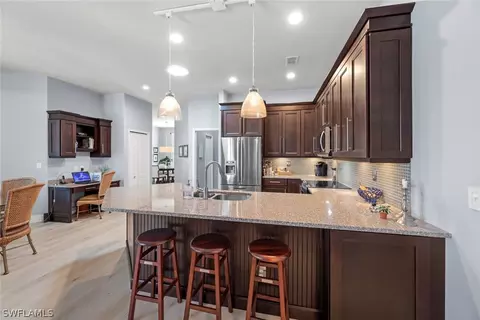 Kitchen - 11418 Stratham Loop, Estero, FL 33928 photo 3 of 5
