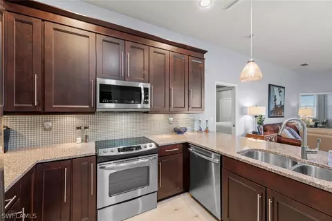 Kitchen - 11418 Stratham Loop, Estero, FL 33928 photo 5 of 5