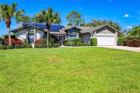 Exterior - 119 Robert Ave, Lehigh Acres, FL 33936 photo 3 of 12