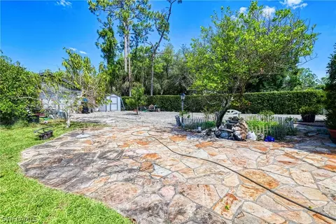 Exterior - 119 Robert Ave, Lehigh Acres, FL 33936 photo 9 of 12