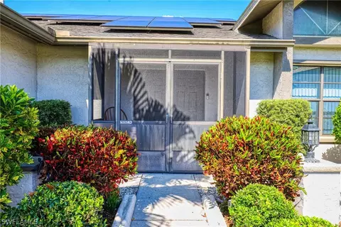 Exterior - 119 Robert Ave, Lehigh Acres, FL 33936 photo 5 of 12