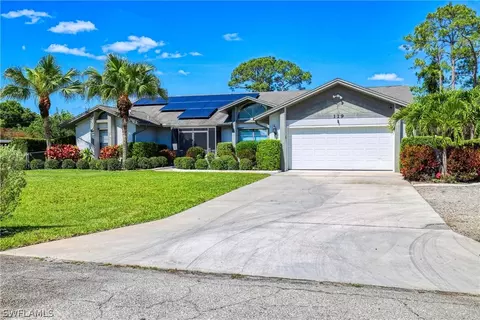 Exterior - 119 Robert Ave, Lehigh Acres, FL 33936 photo 2 of 12