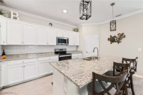 Kitchen - 19675 Beechcrest Pl, Estero, FL 33928 photo 1 of 5