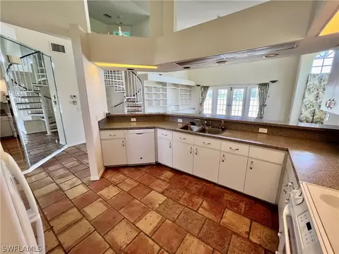 Kitchen - 717 Bently St E, Lehigh Acres, FL 33974 photo 3 of 5