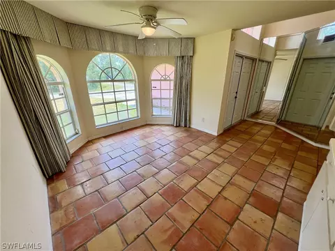 Living - 717 Bently St E, Lehigh Acres, FL 33974 photo 2 of 4