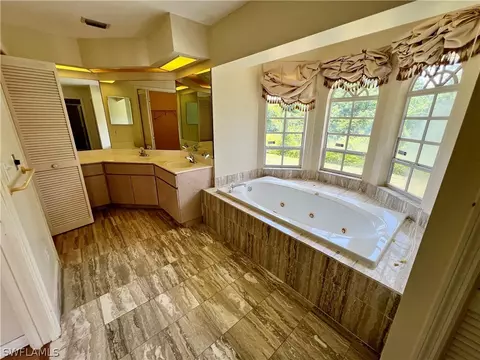 Bath - 717 Bently St E, Lehigh Acres, FL 33974 photo 1 of 9