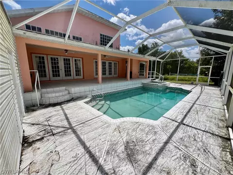 Exterior - 717 Bently St E, Lehigh Acres, FL 33974 photo 6 of 8