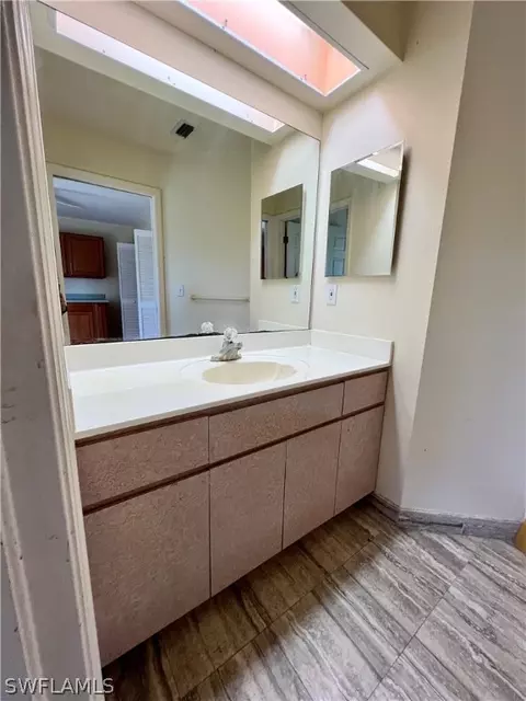 Bath - 717 Bently St E, Lehigh Acres, FL 33974 photo 5 of 9