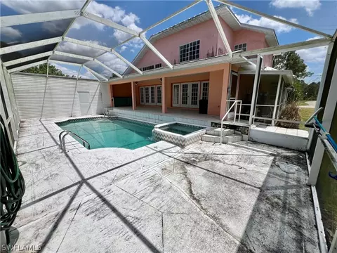 Exterior - 717 Bently St E, Lehigh Acres, FL 33974 photo 5 of 8