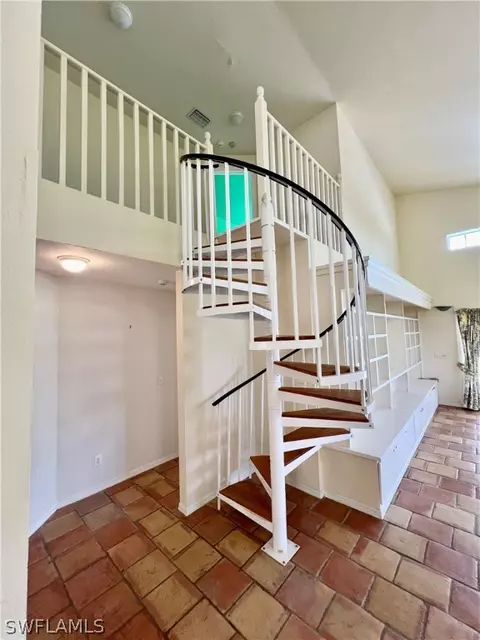 Entry Way - 717 Bently St E, Lehigh Acres, FL 33974 photo 1 of 2