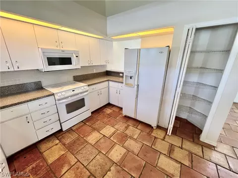 Kitchen - 717 Bently St E, Lehigh Acres, FL 33974 photo 5 of 5