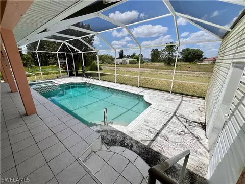 Exterior - 717 Bently St E, Lehigh Acres, FL 33974 photo 3 of 8