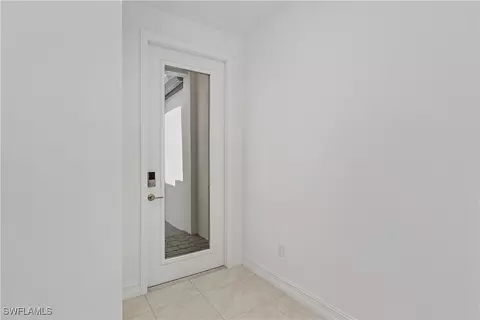 7498 Rockefeller Dr, Naples, FL 34119 photo 3