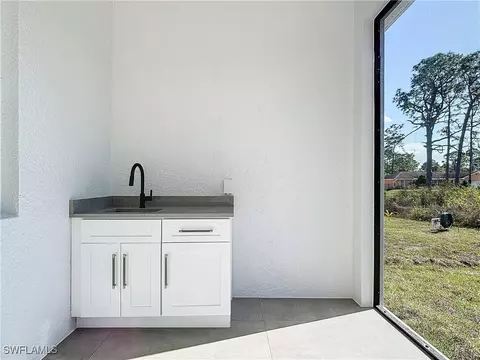 962 Iris St E, Lehigh Acres, FL 33974 photo 28