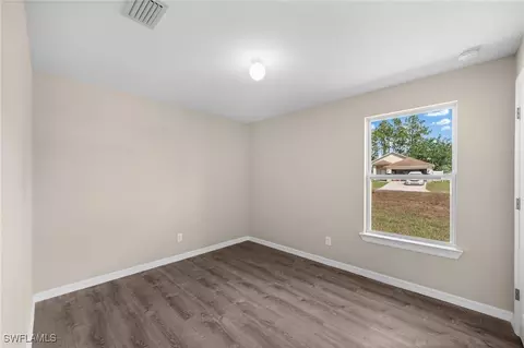 1250 Count St E, Lehigh Acres, FL 33974 photo 14
