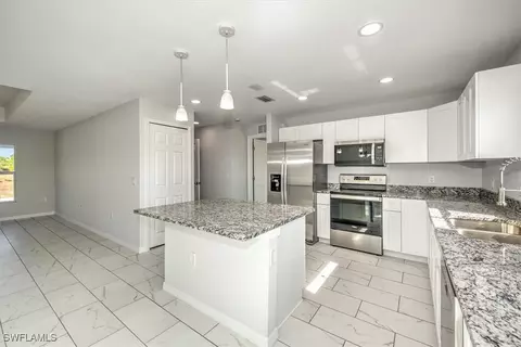 Kitchen - 8024 Melody Cir, Labelle, FL 33935 photo 3 of 4