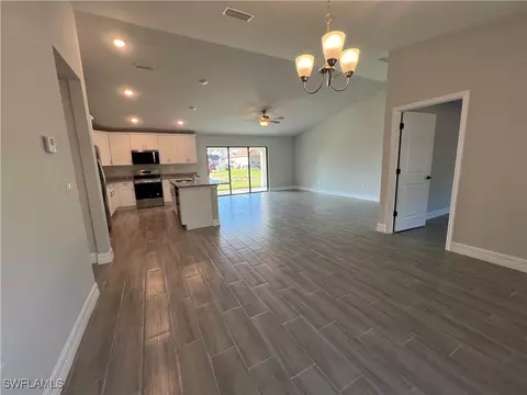 Living - 3003 Olive Ave S, Lehigh Acres, FL 33976 photo 1 of 2
