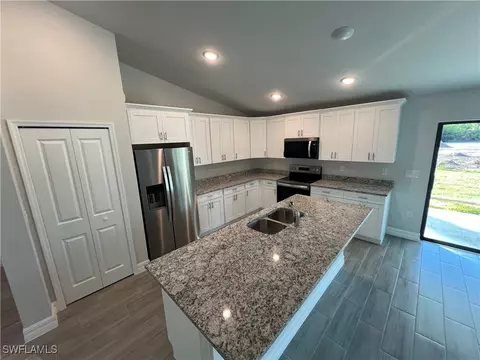 Kitchen - 3003 Olive Ave S, Lehigh Acres, FL 33976 photo 2 of 2