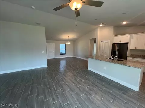 Living - 3003 Olive Ave S, Lehigh Acres, FL 33976 photo 2 of 2