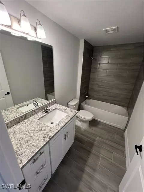 Bath - 3003 Olive Ave S, Lehigh Acres, FL 33976 photo 1 of 3