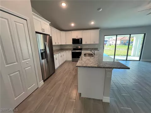 Kitchen - 3003 Olive Ave S, Lehigh Acres, FL 33976 photo 1 of 2