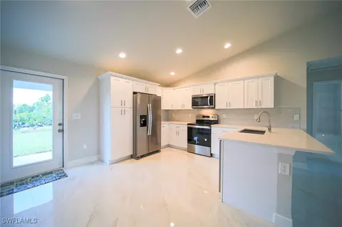 726 Manuel St E, Lehigh Acres, FL 33974 photo 2