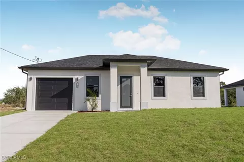 543 Trinity St E, Lehigh Acres, FL 33974