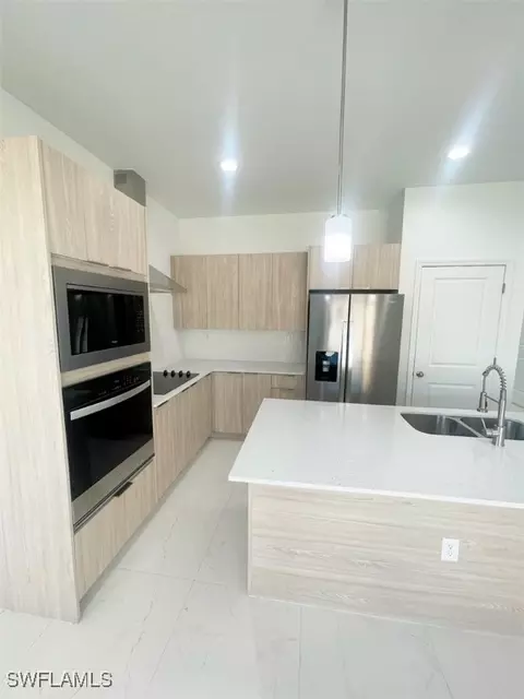 Kitchen - 8023 Piper Ln, Labelle, FL 33935 photo 3 of 8