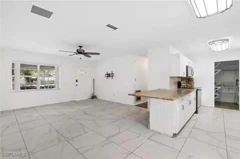 Living - 209 Florida St, Labelle, FL 33935 photo 2 of 4