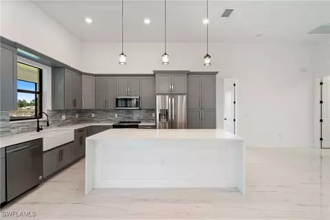 Kitchen - 7824 16th Ter, Labelle, FL 33935 photo 3 of 4