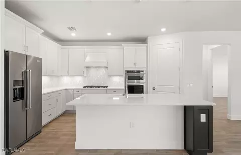 Kitchen - 20530 Pebble Glen Dr, Estero, FL 33928 photo 1 of 2