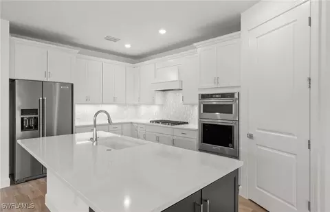 Kitchen - 20530 Pebble Glen Dr, Estero, FL 33928 photo 2 of 2