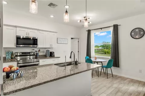 Kitchen - 7942 16th Pl, Labelle, FL 33935 photo 2 of 5