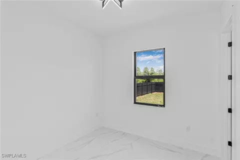 1015 Winters St E, Lehigh Acres, FL 33974 photo 28