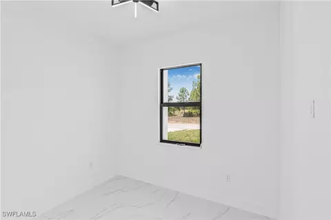1015 Winters St E, Lehigh Acres, FL 33974 photo 22